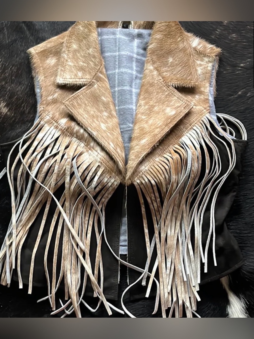 Medium genuine cowhide and fringe vest medium. New